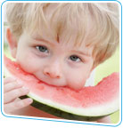 Boy eating watermelon